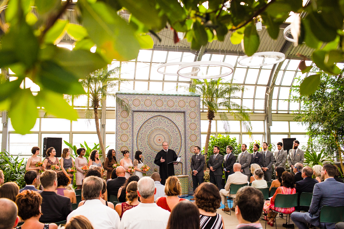 Garfield Park Conservatory Wedding Ali Antonio A Pastor Speaks To Guests At Garfield Park Conservatory Wedding